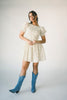 a floral puff sleeve dress with a smocked bodice + mini length. the perfect ditsy floral dress for family pictures, bridal showers, + brunch dates.