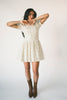 a floral puff sleeve dress with a smocked bodice + mini length. the perfect ditsy floral dress for family pictures, bridal showers, + brunch dates.
