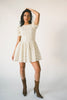 a floral puff sleeve dress with a smocked bodice + mini length. the perfect ditsy floral dress for family pictures, bridal showers, + brunch dates.