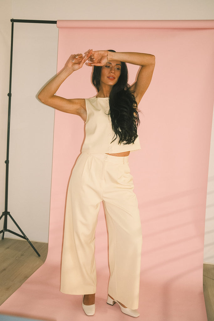 butter yellow pant set with a cropped button up tank + high waisted trousers. the perfect elevated set for the office + everyday wear. 
