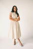 vintage-inspired dress with a fitted button-up bodice. the perfect neutral short sleeve dress for family pictures, bridal showers, + semi-formal events. 
