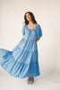 zoco daymaker dress: puff sleeve blue maxi dress with an elastic neckline. perfect for weddings, baby showers, and family pictures.
