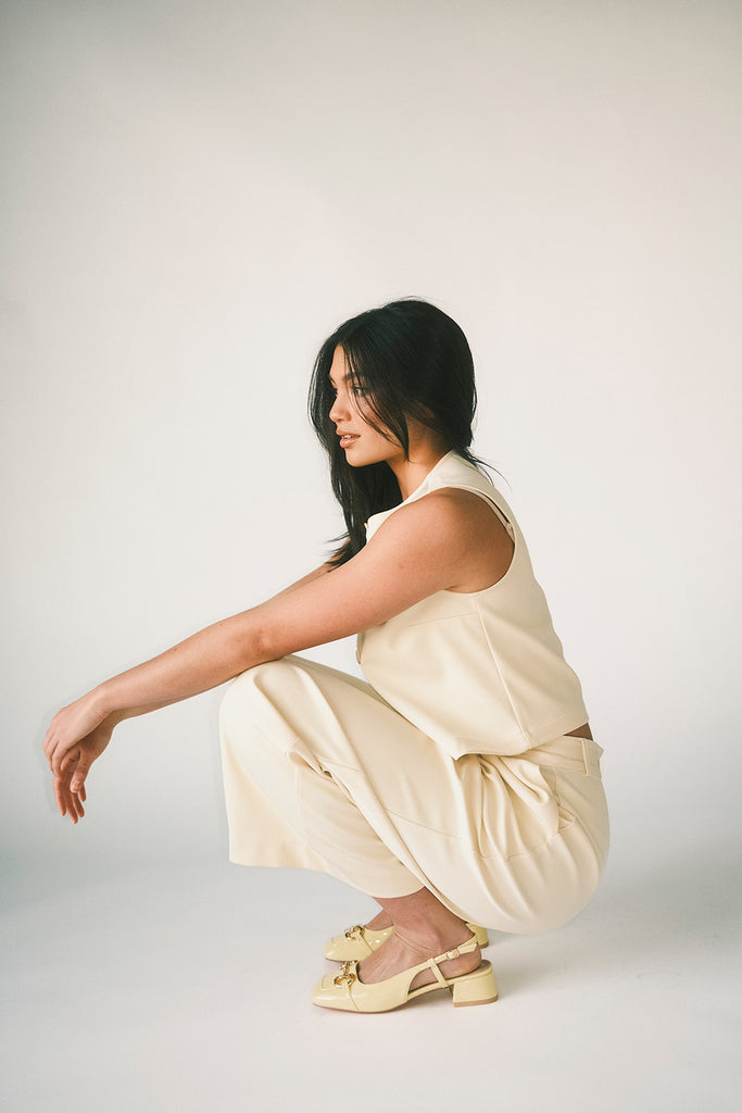 butter yellow pant set with a cropped button up tank + high waisted trousers. the perfect elevated set for the office + everyday wear. 
