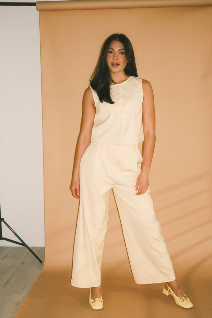 butter yellow pant set with a cropped button up tank + high waisted trousers. the perfect elevated set for the office + everyday wear. 
