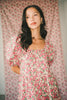 zoco daymaker dress: puff sleeve pink floral maxi dress with an elastic neckline. perfect for weddings, baby showers, + family pictures.