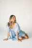 a blue puff sleeve mini dress with lace tiered details + a stretchy square neckline. perfect for family pictures, baby showers, weddings, + special occasions. 
