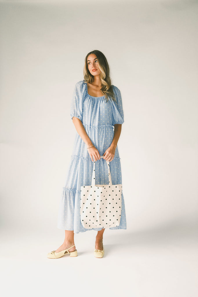 zoco daymaker dress: puff sleeve polka dot dress with an elastic neckline. the perfect blue and yellow polka dot dress for weddings, baby showers, + family pictures.
