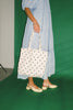 zoco daymaker dress: puff sleeve polka dot dress with an elastic neckline. the perfect blue and yellow polka dot dress for weddings, baby showers, + family pictures.
