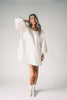 a white satin mini dress with a vintage-inspired silhouette + long balloon sleeves. the perfect little white dress for graduations, bridal showers, + fancy dinner dates.
