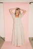 zoco daymaker dress: puff sleeve polka dot dress with an elastic neckline and pink trim details. perfect for weddings, baby showers, and family pictures.