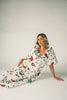 a polka dot puff sleeve dress with floral print details. the perfect polka dot midi dress for baby showers, family pictures, + special occasions. 
