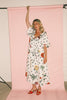 a polka dot puff sleeve dress with floral print details. the perfect polka dot midi dress for baby showers, family pictures, + special occasions. 
