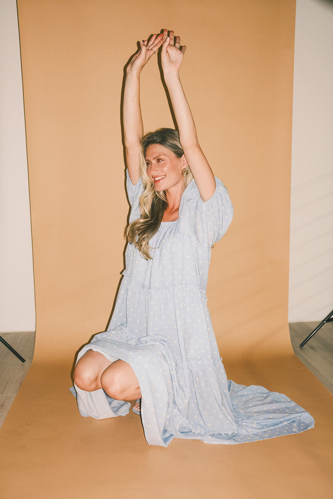 zoco daymaker dress: puff sleeve polka dot dress with an elastic neckline. the perfect blue and yellow polka dot dress for weddings, baby showers, + family pictures.
