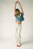 a short sleeve denim top with an oversized lace collar + a cropped silhouette. the perfect button up denim top to dress up or down for any outfit idea.
