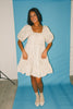 zoco daymaker dress: a short puff sleeve dress with a grid-style pattern + an elastic neckline. perfect for family pictures, weddings, and baby showers.
