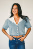 a short sleeve denim top with an oversized lace collar + a cropped silhouette. the perfect button up denim top to dress up or down for any outfit idea.

