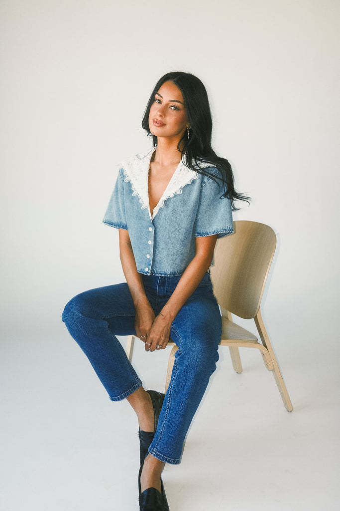 a short sleeve denim top with an oversized lace collar + a cropped silhouette. the perfect button up denim top to dress up or down for any outfit idea.
