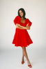 zoco daymaker dress: a short puff sleeve dress with an elastic neckline. the perfect red cotton dress for family pictures, weddings, and baby showers.
