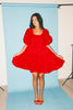 zoco daymaker dress: a short puff sleeve dress with an elastic neckline. the perfect red cotton dress for family pictures, weddings, and baby showers.
