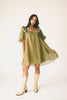 a green floral puff sleeve mini dress with a ruffle neckline. the perfect vintage-inspired dress for baby showers, family pictures, + special occasions. 
