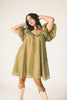 a green floral puff sleeve mini dress with a ruffle neckline. the perfect vintage-inspired dress for baby showers, family pictures, + special occasions. 
