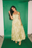 a flowy v-waist green dress with a sleek scoop neckline + subtle floral print. the perfect vintage-inspired maxi dress for weddings, bridal showers, + garden parties.

