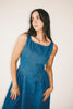 a vintage-inspired denim dress with a boat neckline + a v-shaped waistline. the perfect denim midi dress for family pictures, brunch dates, + special occasions. 

