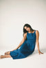 a vintage-inspired denim dress with a boat neckline + a v-shaped waistline. the perfect denim midi dress for family pictures, brunch dates, + special occasions. 
