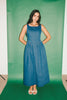 a vintage-inspired denim dress with a boat neckline + a v-shaped waistline. the perfect denim midi dress for family pictures, brunch dates, + special occasions. 
