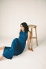 a vintage-inspired denim dress with a boat neckline + a v-shaped waistline. the perfect denim midi dress for family pictures, brunch dates, + special occasions. 
