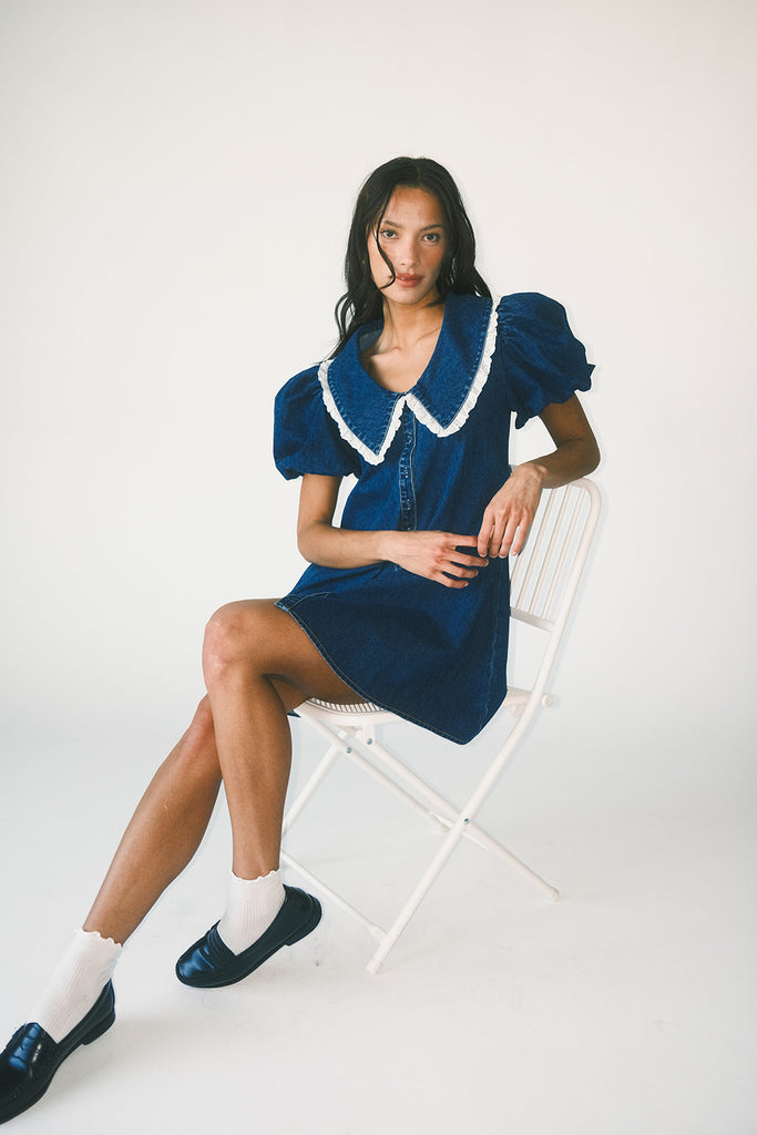 a puff sleeve denim dress with a lace trimmed collar detail. the perfect denim mini dress for date nights, family pictures, + everyday wear.
