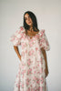 a pink floral puff sleeve dress with a ruffle neckline. the perfect vintage-inspired dress for baby showers, family pictures, + special occasions.
