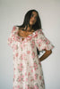 a pink floral puff sleeve dress with a ruffle neckline. the perfect vintage-inspired dress for baby showers, family pictures, + special occasions.
