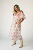 a pink floral puff sleeve dress with a ruffle neckline. the perfect vintage-inspired dress for baby showers, family pictures, + special occasions.
