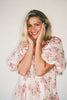 a pink floral puff sleeve dress with a ruffle neckline. the perfect vintage-inspired dress for baby showers, family pictures, + special occasions.
