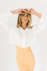 orange mini dress with a sweetheart neckline, ribbed texture, bodycon fit