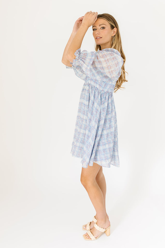 baby blue plaid mini dress with square neckline, balloon sleeves, back zipper, and fully lined.