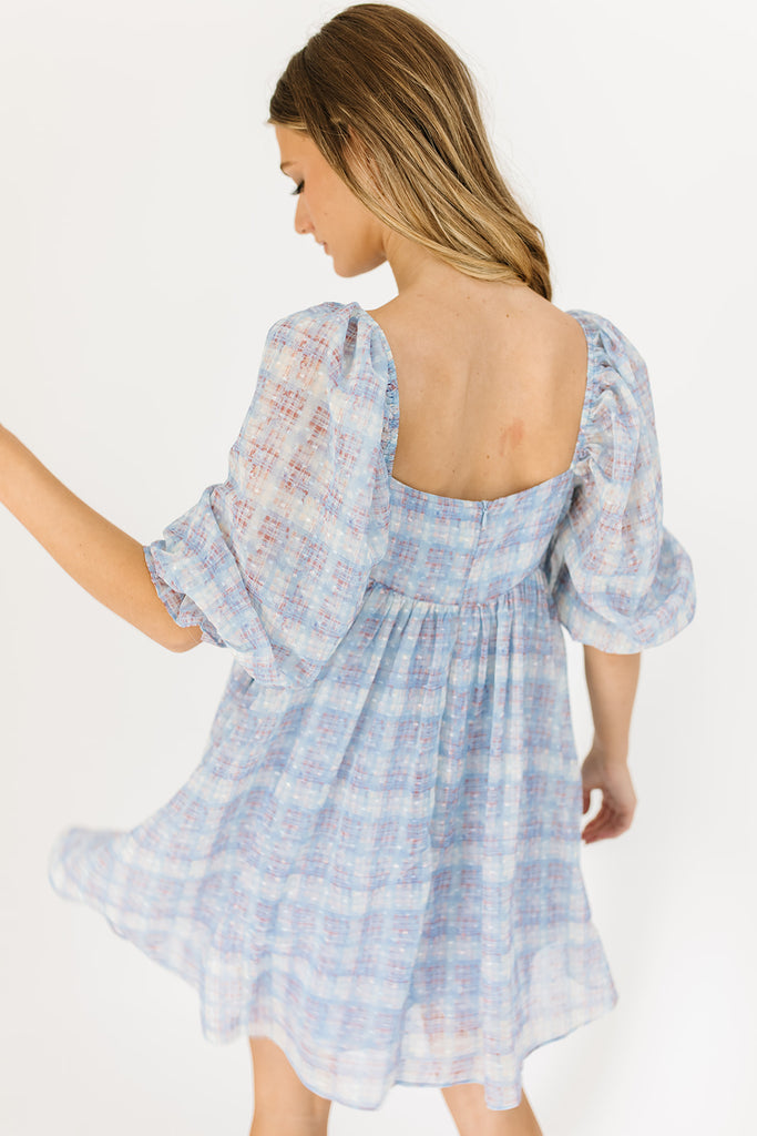 baby blue plaid mini dress with square neckline, balloon sleeves, back zipper, and fully lined.
